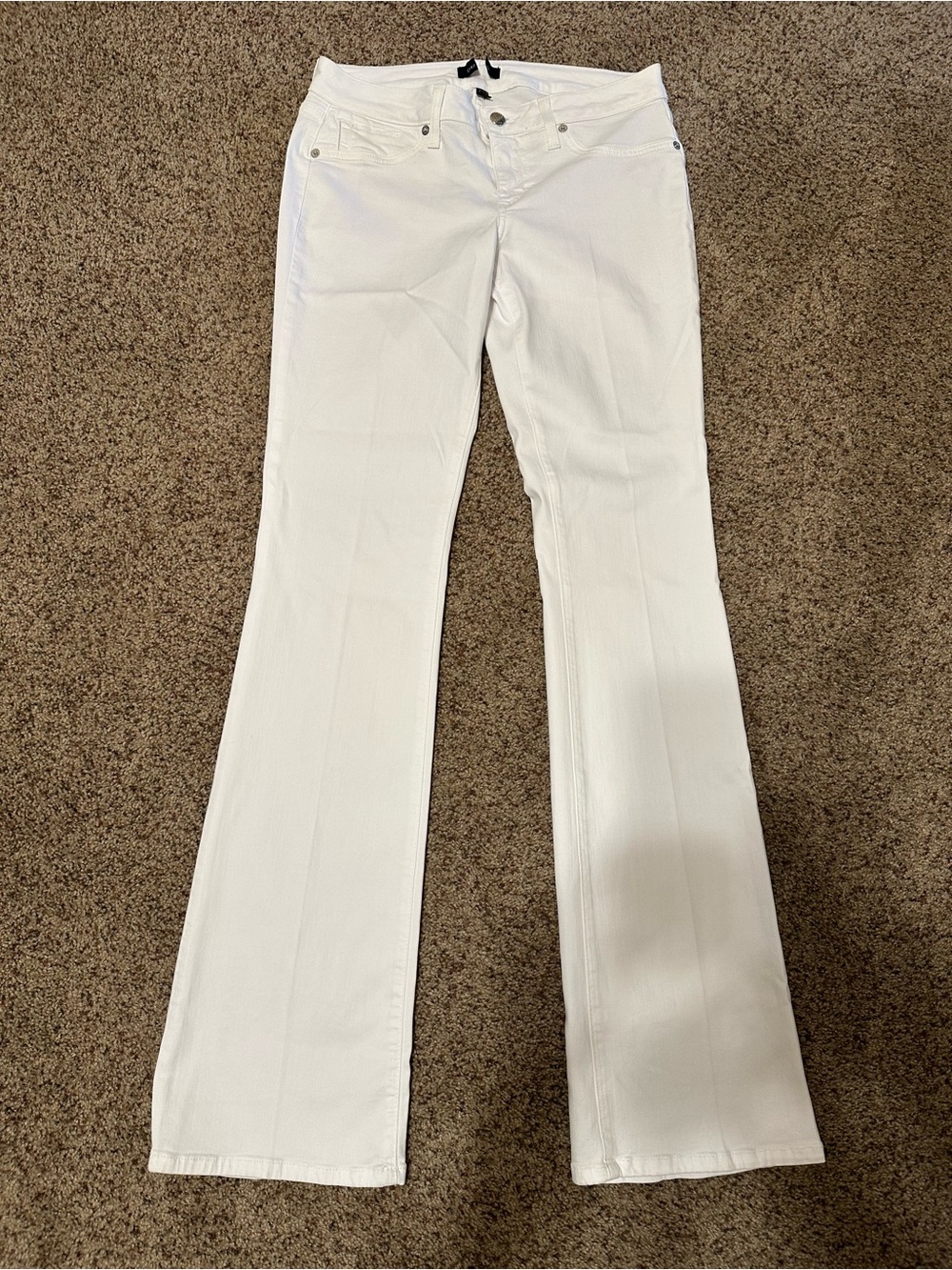 Bebe White low rise boot cut jean